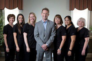 Dr. Roy Jennings and dental staff in Monroe